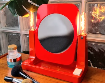 Charming vintage illuminated makeup mirror by Schott. 1970s. Space Age. Mid Century.