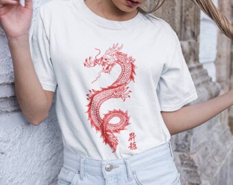 white shirt with red dragon