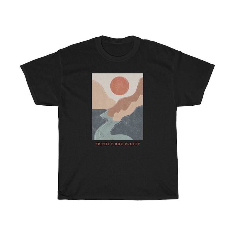 May include: Black t-shirt with a graphic of a stylized landscape with a river, mountains, and a red sun. The text "PROTECT OUR PLANET" is printed below the graphic.