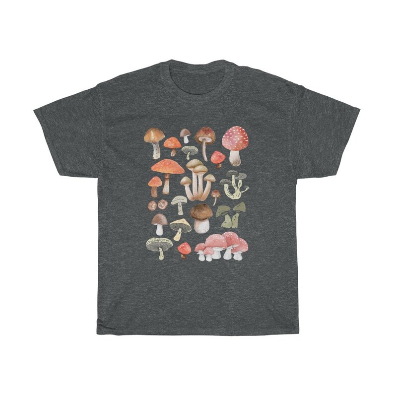May include: A dark heather grey t-shirt with a colorful mushroom print. The mushrooms are various shades of red, orange, brown, and white.