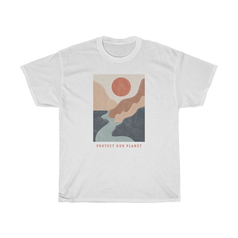 May include: White t-shirt with a graphic of a mountain range with a red sun and a blue river. The text "PROTECT OUR PLANET" is printed below the graphic.