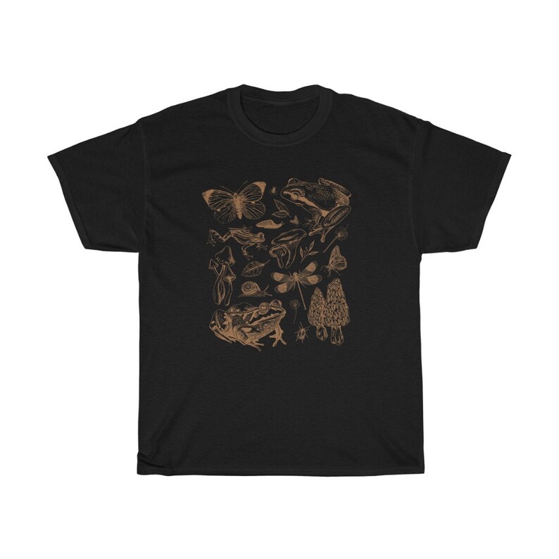 May include: Black t-shirt with a brown graphic print of various forest creatures, including butterflies, frogs, mushrooms, and dragonflies.