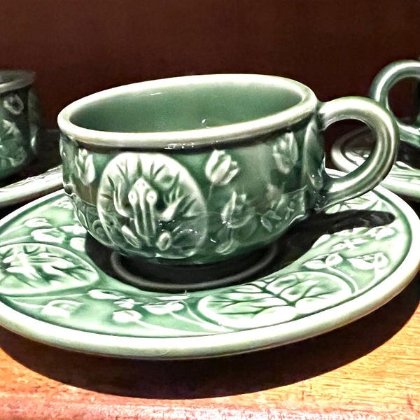 May include: A set of three ceramic mugs with a speckled, matte finish in cream, light grey, and dark grey. Each mug has a simple, modern design and a comfortable handle. Ideal for tea or coffee.