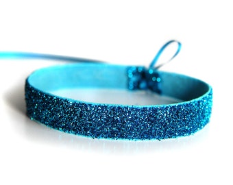 GLIMMER CHOKER TURQUOISE - Lovely, stretchy, turquoise velvet choker, which is individually tied with satin ribbons - eye-catching and suitable for parties