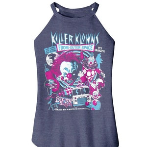 May include: A blue sleeveless shirt with a graphic print of clowns from the movie Killer Klowns from Outer Space. The graphic includes the text "Killer Klowns from Outer Space" and "It's Craazy!" The graphic also includes a clown holding a hot dog, a clown holding a knife, and a clown holding a red balloon. The graphic also includes a food truck with the text "Big Top Burger".