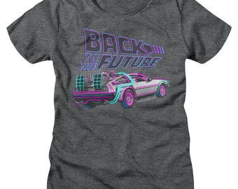 May include: A heather grey t-shirt featuring a graphic of the DeLorean time machine from the film "Back to the Future". The text "Back to the Future" is in neon blue and pink.