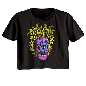 May include: Black cropped t-shirt with a pink and blue skull graphic. The skull has an eye and a hand covering the eye. The skull is surrounded by yellow flames and the word "Incubus" is written in the flames.