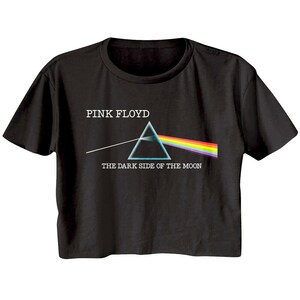 May include: Black cropped t-shirt with a graphic of Pink Floyd's "The Dark Side of the Moon" album cover. The graphic features a prism and a rainbow.