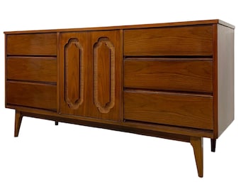 Free shipping within continental US - Vintage Mid Century Modern Walnut Toned Credenza with Cane Door Front and Dovetailed Drawers