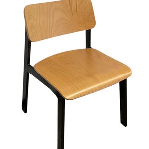 May include: A wooden chair with a light brown seat and backrest. The chair has a black metal frame and legs. The seat is curved for comfort, and the backrest is rectangular.