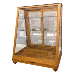 Free Shipping within continental US - Antique Retail Oak Display Cabinet from Wells Butchers’ Supply Co. Seattle, Slanted Glass Showcase