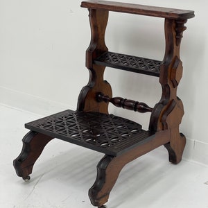 Free Shipping Within Continental US Antique table with metal accent and casters. image 5