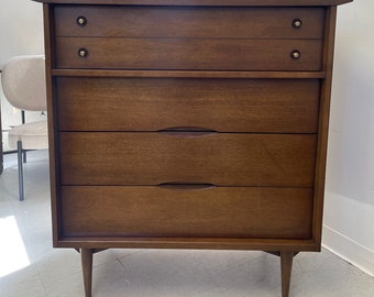 Free Shipping Within Continental US -  Vintage Mid Century Modern Atomic Shape Walnut Toned Dresser.