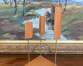 Free shipping within continental US -  Mid-Century Modern Possibly Teak and Twisted Metal Triple Candle Holder with Geometric Base