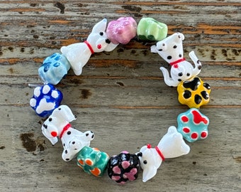 Hunde und Pfoten Armbänder, Lampwork und Keramik Porzellan Doggie Perlen Armband