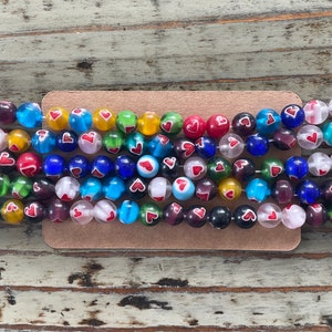 Millefiori Lampwork Glasperlenstrang 8 mm Herzen, bunte Herzen