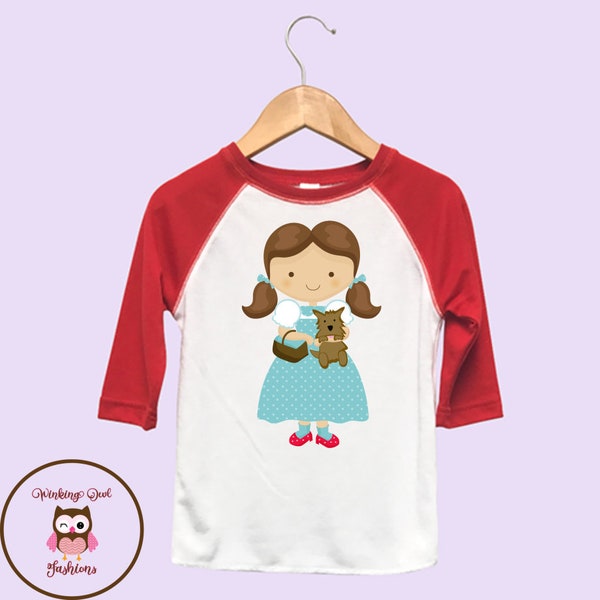 Dorothy and Toto Not in Kansas Anymore Wizard Oz Cartoon Character Infant / Toddler / Youth 3/4 Length Raglan Sleeve (Black or Red)