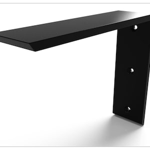 May include: Black metal shelf bracket with a flat, angled top and three holes on the vertical side.