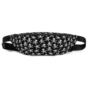 May include: Black fanny pack with a white skull and crossbones pattern.