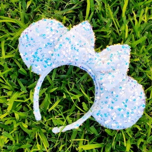 Oreilles de Minnie blanches irisées,