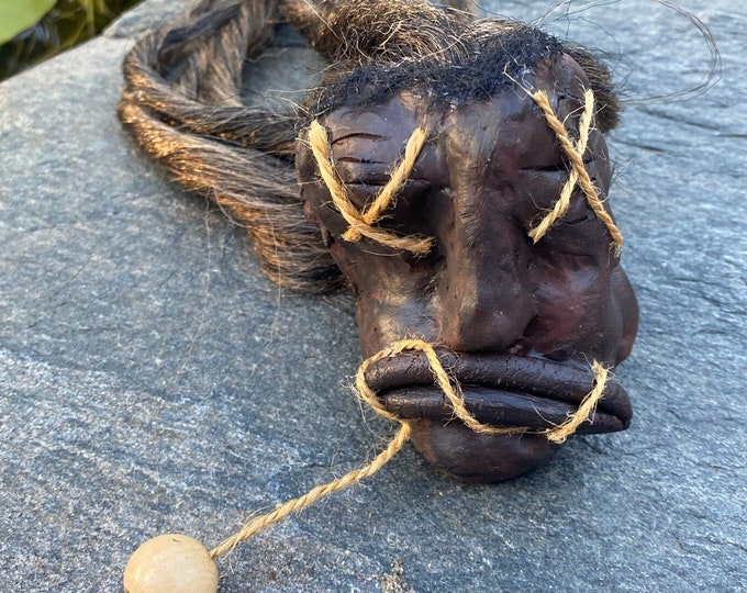 Handmade Shrunken Head with Eyes Stitched Shut