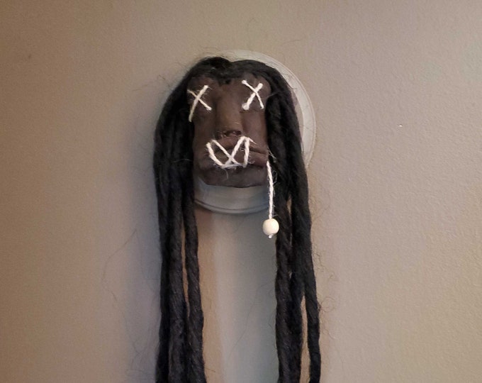 Wall Mounted Shrunken Head on Wooden Plaque