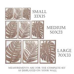 May include: Set of three wood wall decor pieces featuring cut-out tropical leaf designs. The pieces are available in three sizes: small (33 x 15 inches), medium (50 x 23 inches), and large (70 x 33 inches).