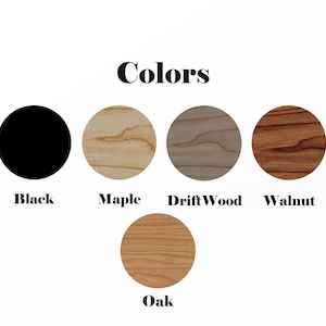 May include: Five color swatches showing different wood finishes: black, maple, driftwood, walnut, and oak.