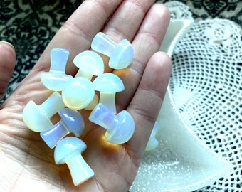 Opalite carved mushroom. Free spell option. Associated with: Wealth, Meditation, Love, Hope, Dreamwork, Business Success.