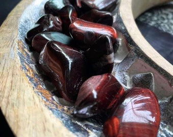 Red Tigers Eye with free spell option. Associated with: Survival, Root chakra, Grounding, Motivation, Energy, Ambition.