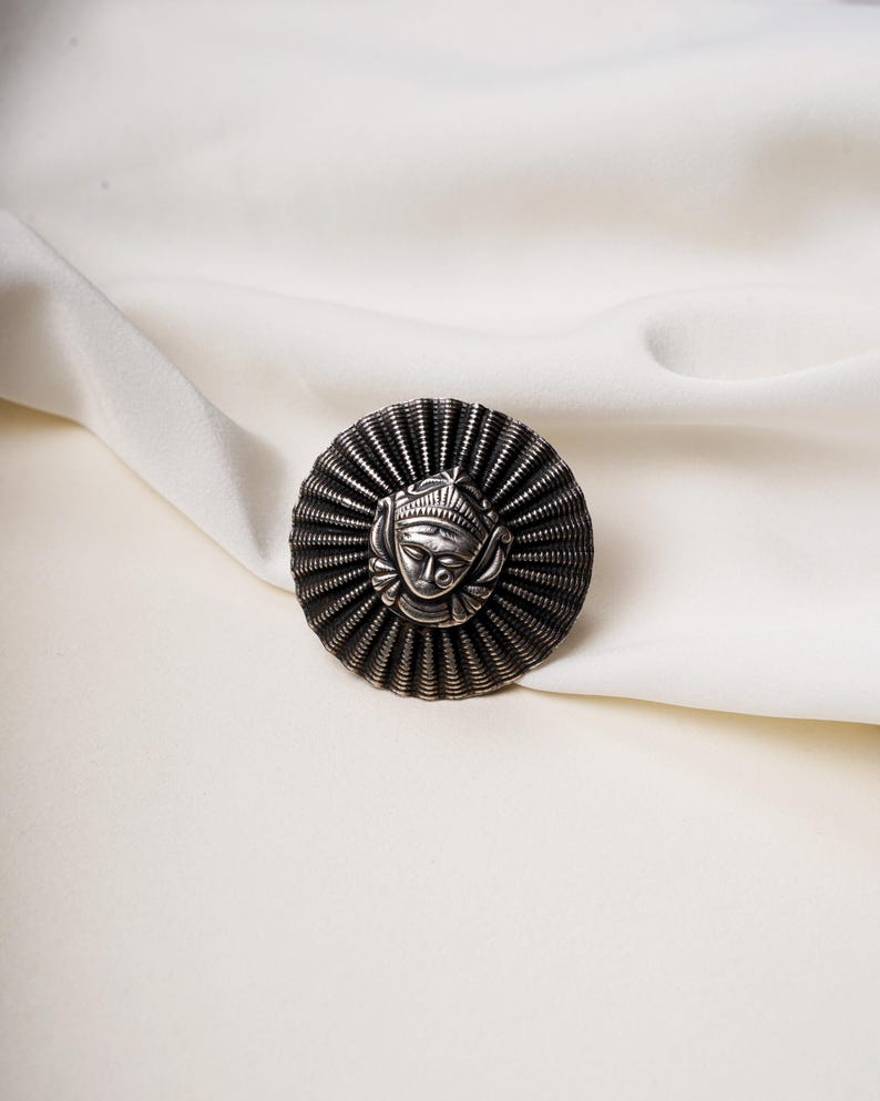 925 sterling silver adjustable ring featuring intricately carved Durga Maa motif with oxidised detailing, lightweight at 10.9 grams, handmade spiritual jewelry.