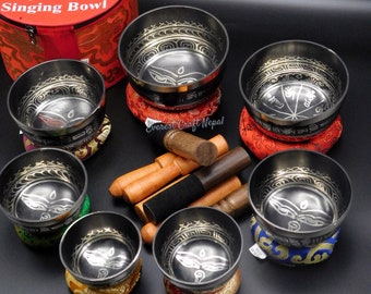 Set of 7 Black Buddha Eyes carved Mantra Singing Bowl - Used for Meditation, Himalayan Yoga bowls - health and wellness