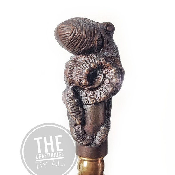 Octopus-inspired Walking Stick: A Symbol of Adaptability and brainpower octopus walking stick walking cane brass walking stick