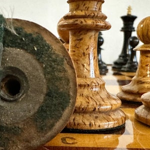 A rare chess set made from Karelian birch, prominent for being depicted in the most famous chess photograph of all time. image 9