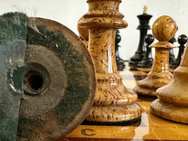 A rare chess set made from Karelian birch, prominent for being depicted in the most famous chess photograph of all time. image 9