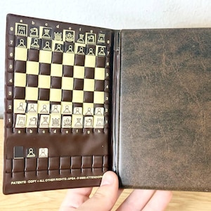 Pocket Germany chess, chess pieces made of plastic.  In very good condition.  Great gift for mens and chess lovers!