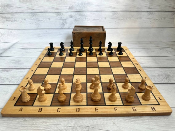 Wooden chess board with starting position