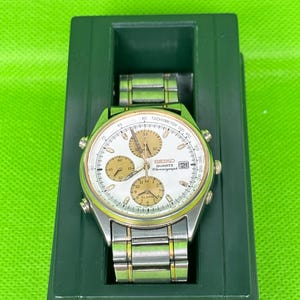 Seiko Two Tone Men&#39;s Chronograph Date Alarm Wristwatch 7T32-7B30 in good condition . Great gift for lovers and collectors!