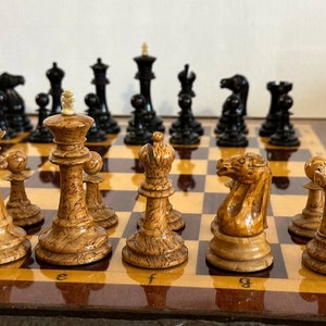 A rare chess set made from Karelian birch, prominent for being depicted in the most famous chess photograph of all time. image 4