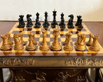 A rare chess set made from Karelian birch, prominent for being depicted in the most famous chess photograph of all time.