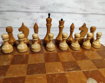 Nice USSR chess set of medium size in good condition, the board is in poor condition.  Chess pieces in very good condition.