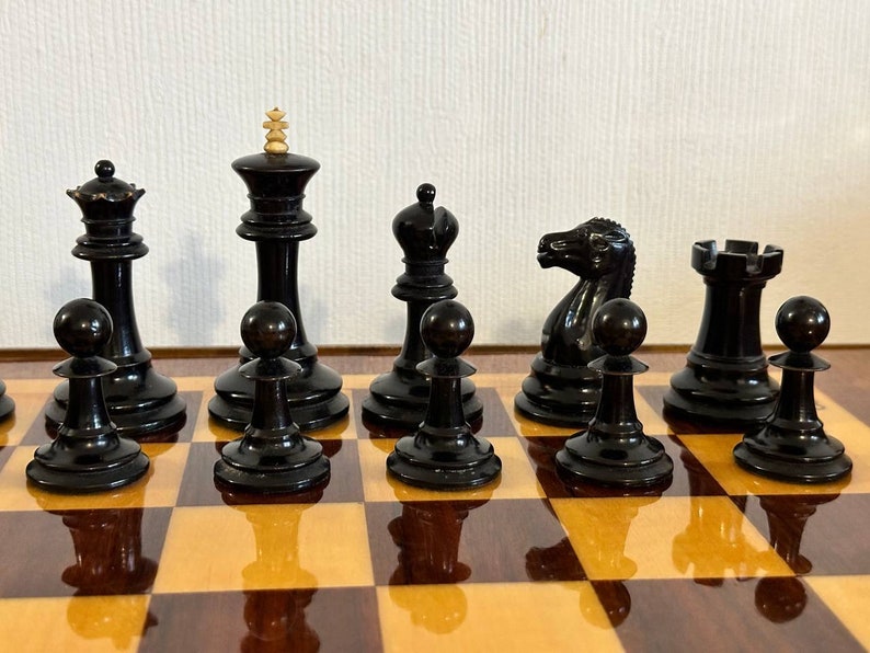 A rare chess set made from Karelian birch, prominent for being depicted in the most famous chess photograph of all time. image 6