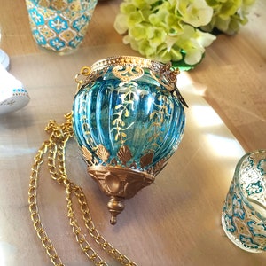 Bronze scrollwork tealight lamp - Baby blue Glass Hanging Lantern - Eclectic decor