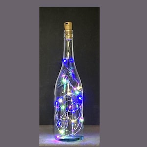 Wine Bottle Decor, Lighted Bottle, Bottle Lights, Wine Bottle Lights, of assorted sizes with white or colored fairy lights.