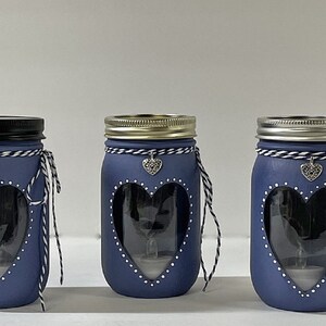 Blue Heart Jars with assorted lids.