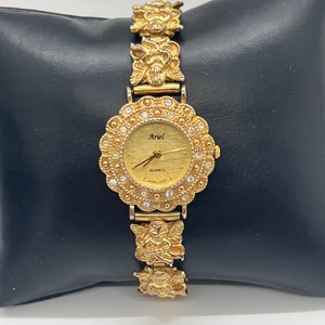 Ariel Gold Tone Crystal Floral Angel Bracelet Watch Vintage Ariel Angels Watch Women Gold Tone Cherub 6.5  main image 4
