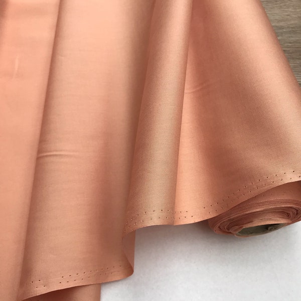 tissu coton orange pastel