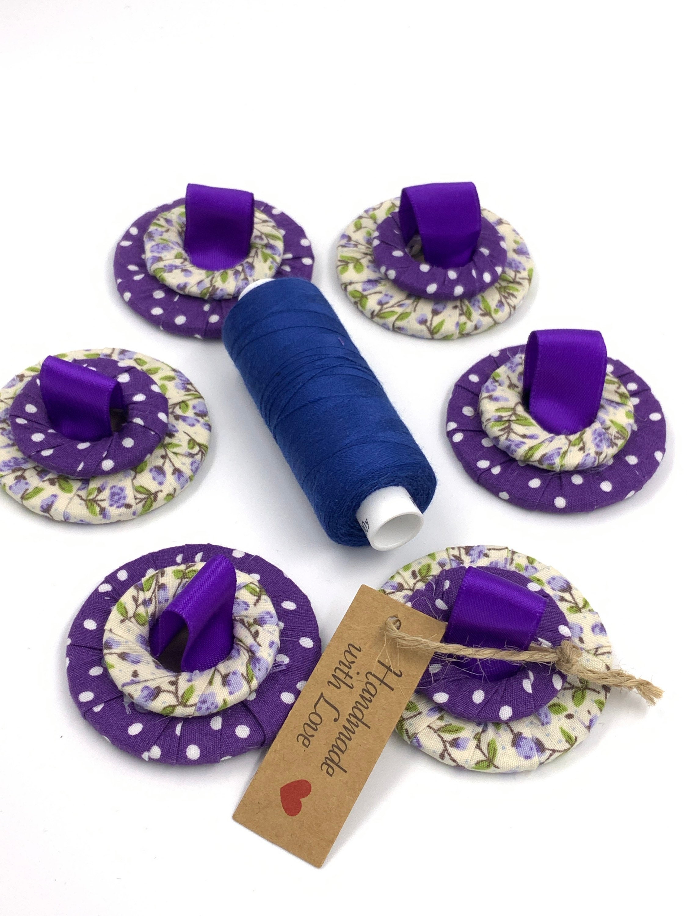 Set of 6- 5cmx4cm Hand wrapped Fabric Steel Sewing Pattern /paper Weights including ribbon. Weighing average of 50 g Great sewing gift