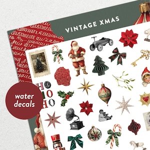 Könnte beinhalten: Ein Bogen mit Vintage-Weihnachts-Wassertattoos. Der Bogen zeigt verschiedene festliche Bilder, darunter Weihnachtsmann, Weihnachtsstern, Ornamente und ein Oldtimer. Der Text "VINTAGE XMAS" ist oben abgebildet, und "water decals" steht auf einem roten Kreis.