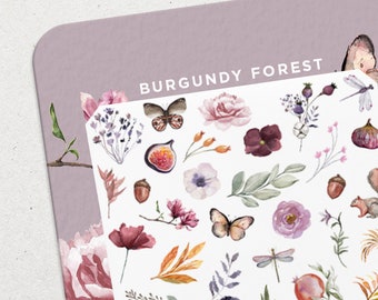 Könnte beinhalten: Eine Bogen mit Aufklebern mit weißem Hintergrund und verschiedenen Aquarell-Illustrationen. Die Illustrationen zeigen Schmetterlinge, Blumen, Blätter, Feigen, Eicheln, Libellen und ein Eichhörnchen. Der Text "BURGUNDY FOREST" ist oben auf dem Bogen gedruckt.